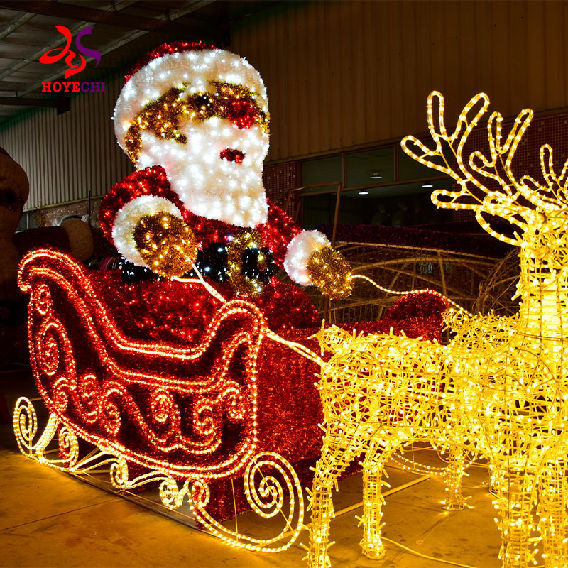 Outdoor Christmas decoration featuring 3D Santa reindeer sleigh lights