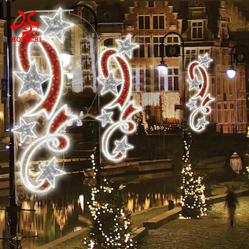 Pole mounted street motif lights decorating a festive city roadwa