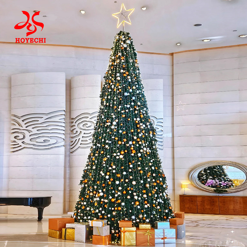 Artificial Christmas tree with LED lights and colorful ornaments, surrounded by wrapped gifts.