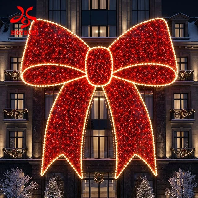 Concept rendering of a red and warm-white illuminated bow on a building façade
