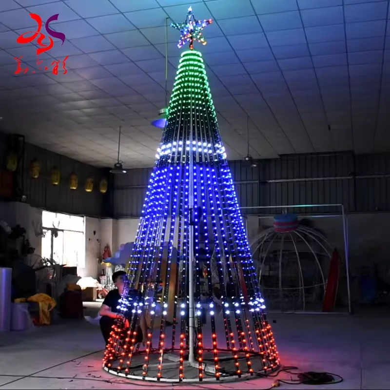 Four meter LED pixel tree displaying green blue white and red programmed sections