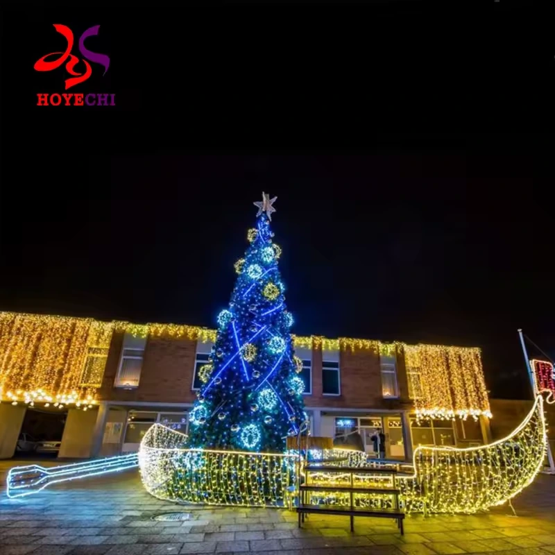 Illuminated boat-shaped Christmas display with a blue lighted tree