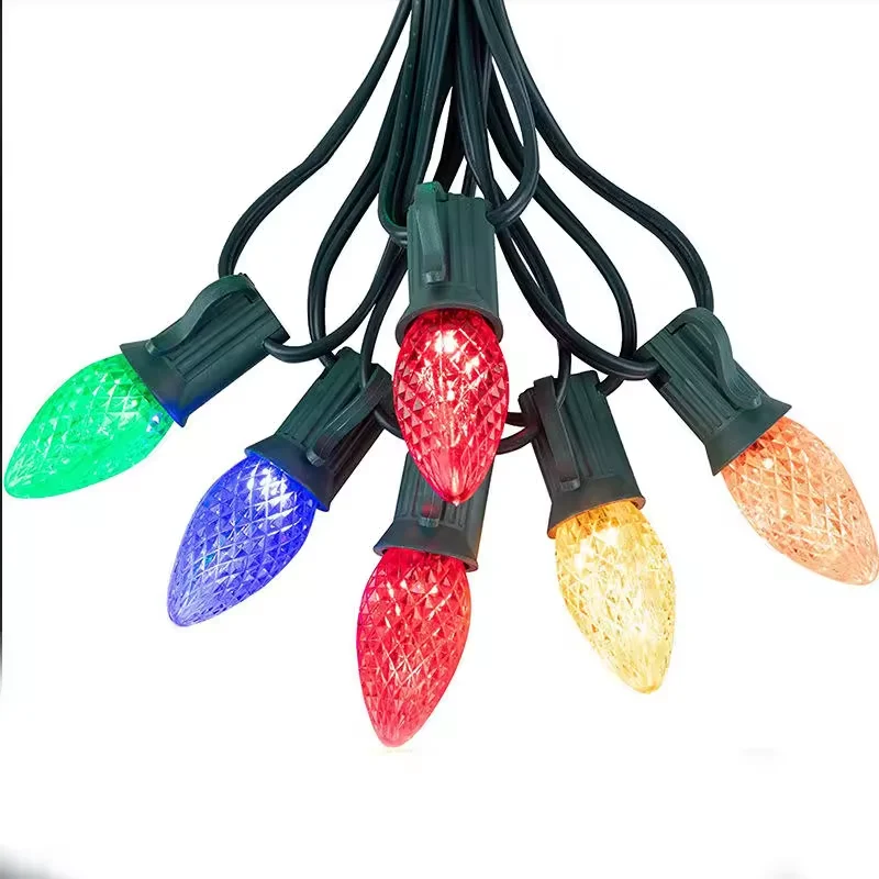Multicolor C7 C9 LED string lights with faceted bulbs and dark green cable