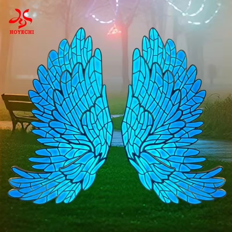 Blue illuminated angel wings with layered feather outlines