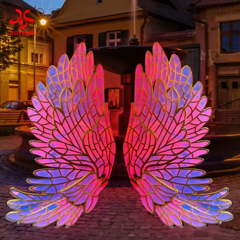 Angel wings photo backdrop with pink illumination