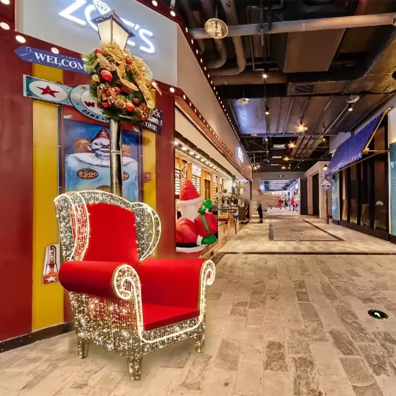 Illuminated red Christmas photo chair in a shopping mall