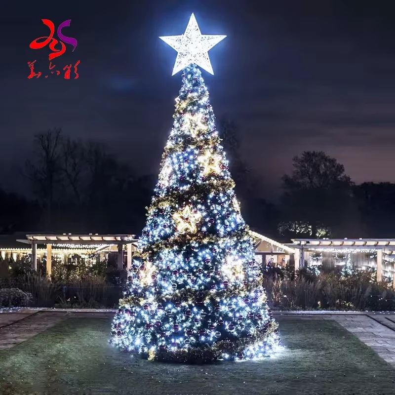 Alternative winter Christmas tree with white snowflake lights and an illuminated star topper
