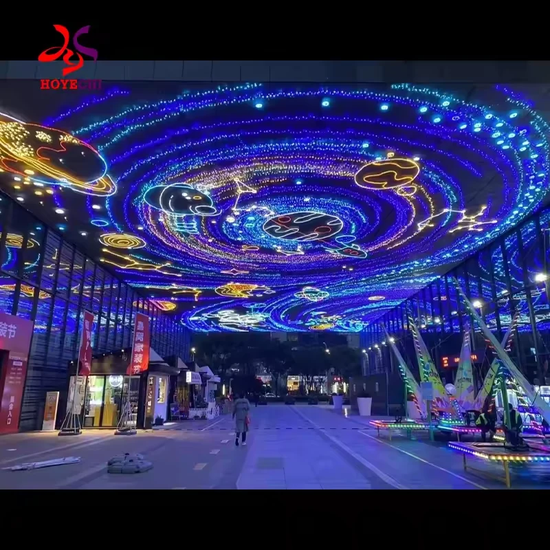 Overhead LED light art canopy above a commercial pedestrian street
