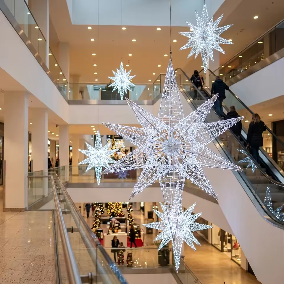 Suspended three dimensional star lights in a shopping mall