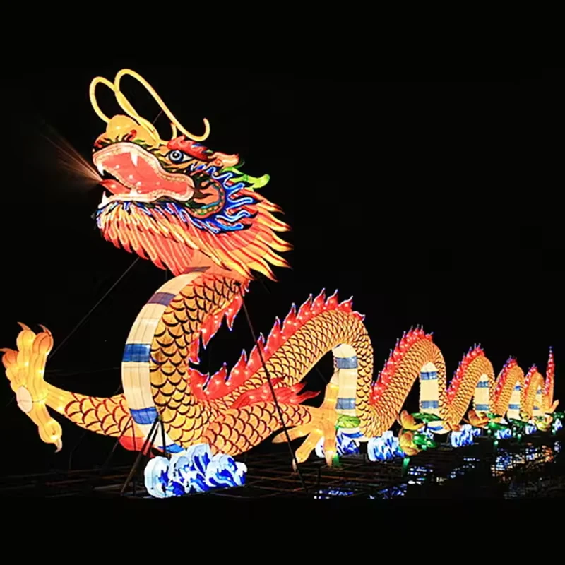 Side view of a long LED dragon lantern with gold scales and blue wave accents