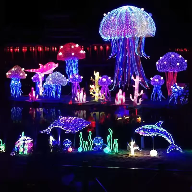 Giant LED jellyfish light with blue illuminated tentacles in an ocean themed display