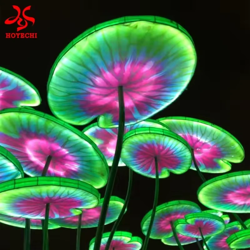 Close view of green and pink illuminated lotus leaf undersides