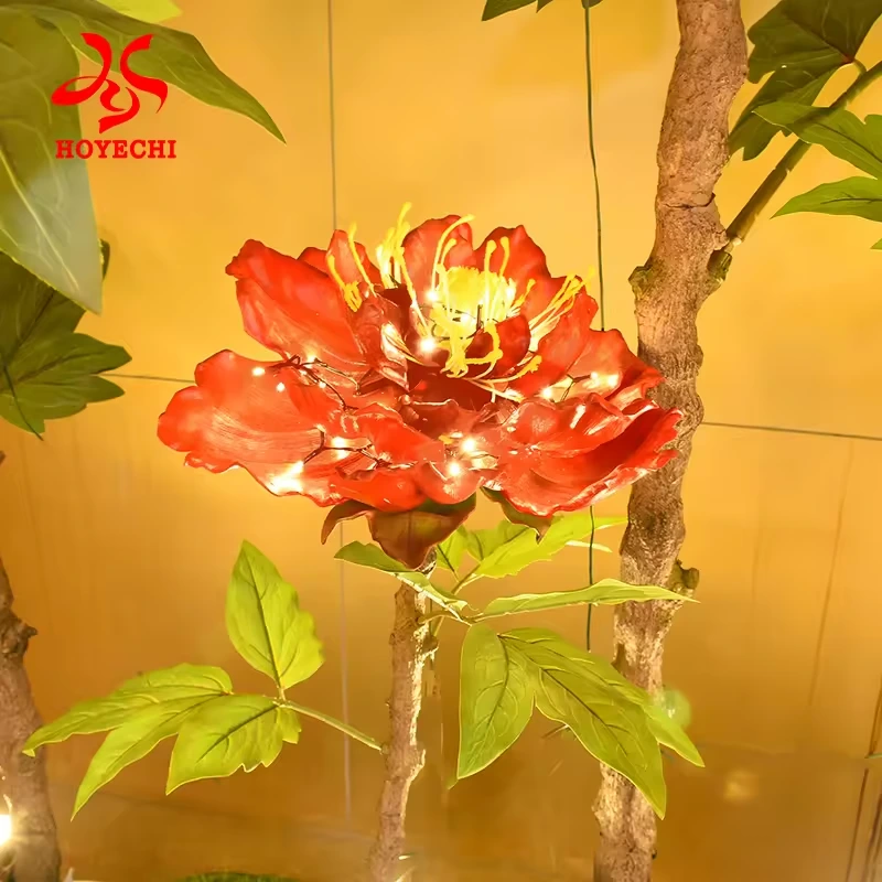 Close-up of red peony petals with decorative LED lighting
