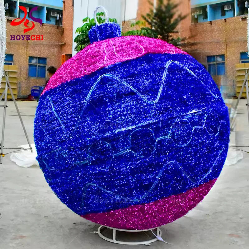 Blue and pink commercial Christmas bauble showing its daytime finish and base ring