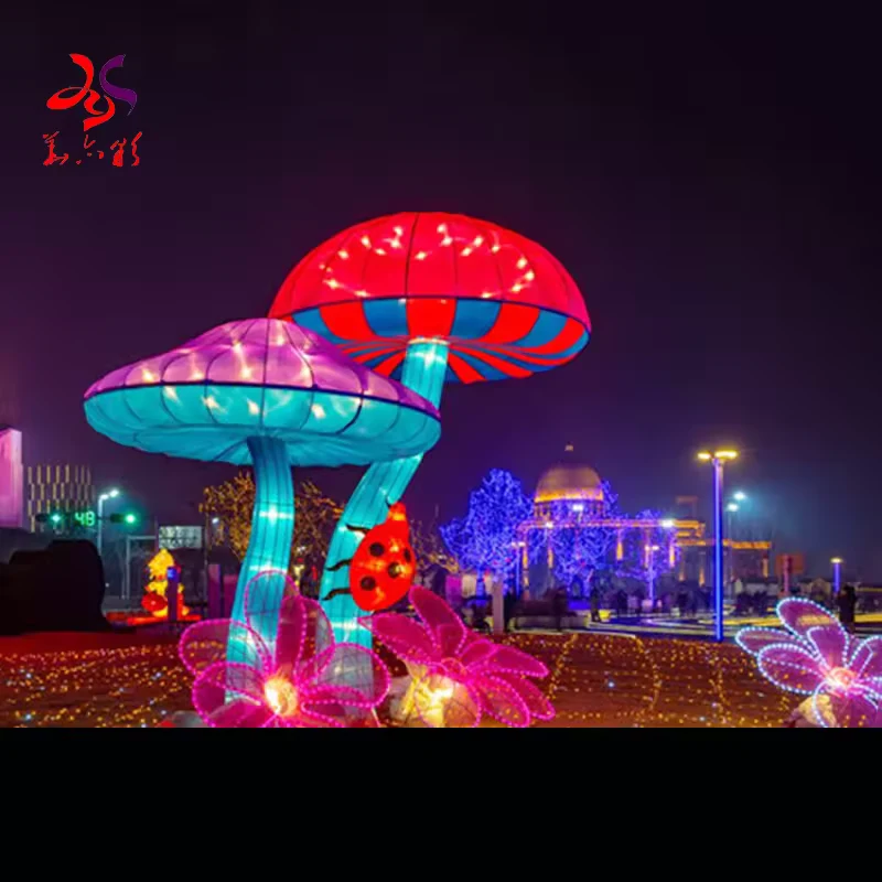 Large illuminated mushroom lanterns with red caps and blue stems at night