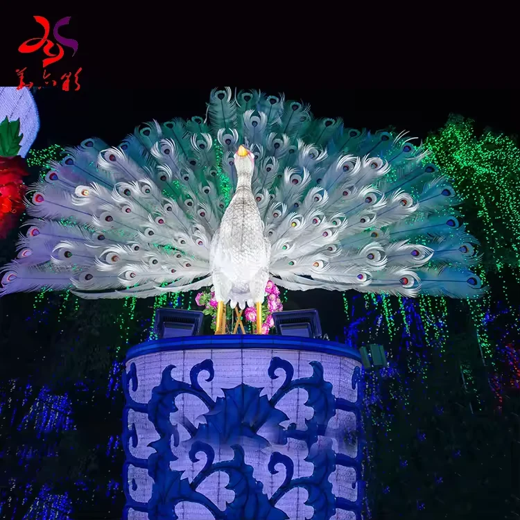 White peacock lantern with an open feather fan on a decorative pedestal at night