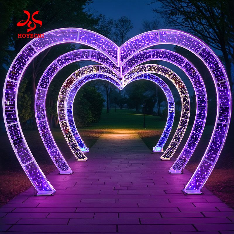Multi-layer walk-through heart arch light with purple LED illumination for outdoor romantic event display
