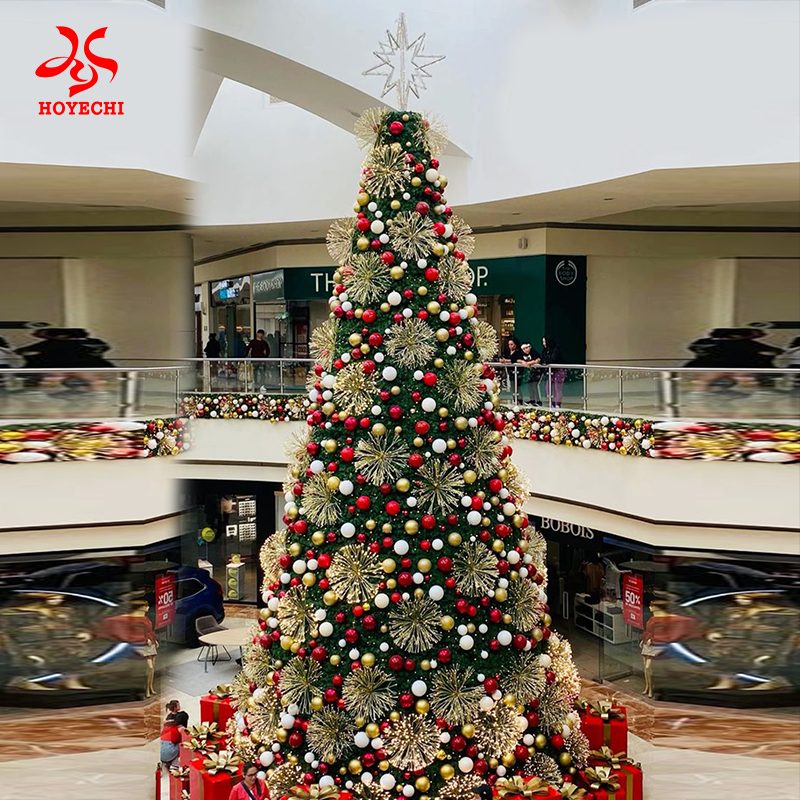 Indoor giant Christmas tree with starburst ornaments and bauble décor for shopping mall holiday display