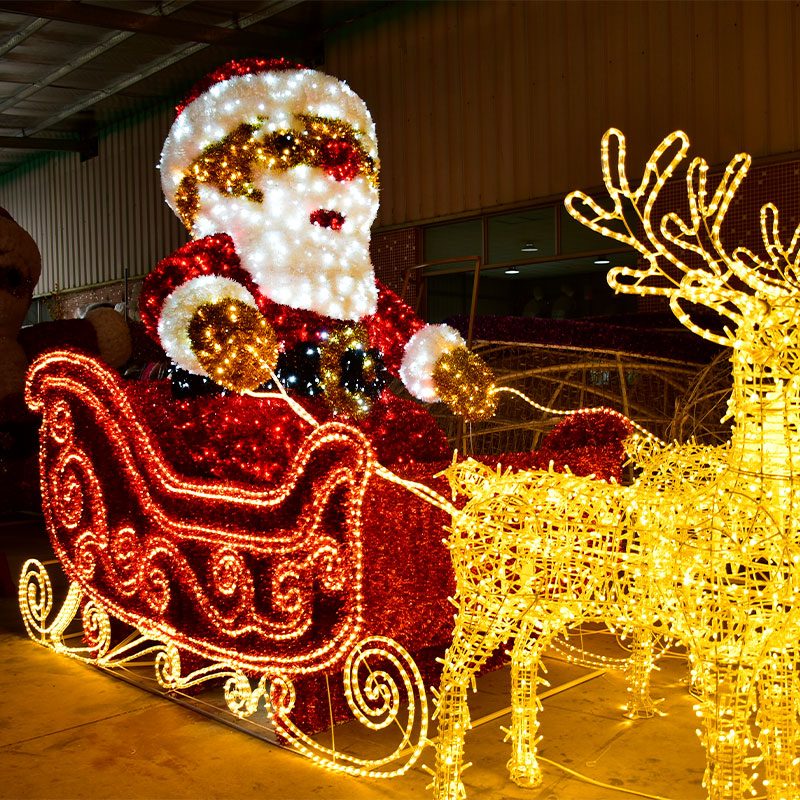 Giant LED Santa sleigh with reindeer lights for outdoor Christmas display