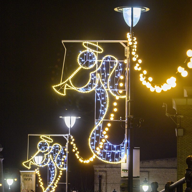 Angel street light pole motif with LED lights for festive outdoor decoration