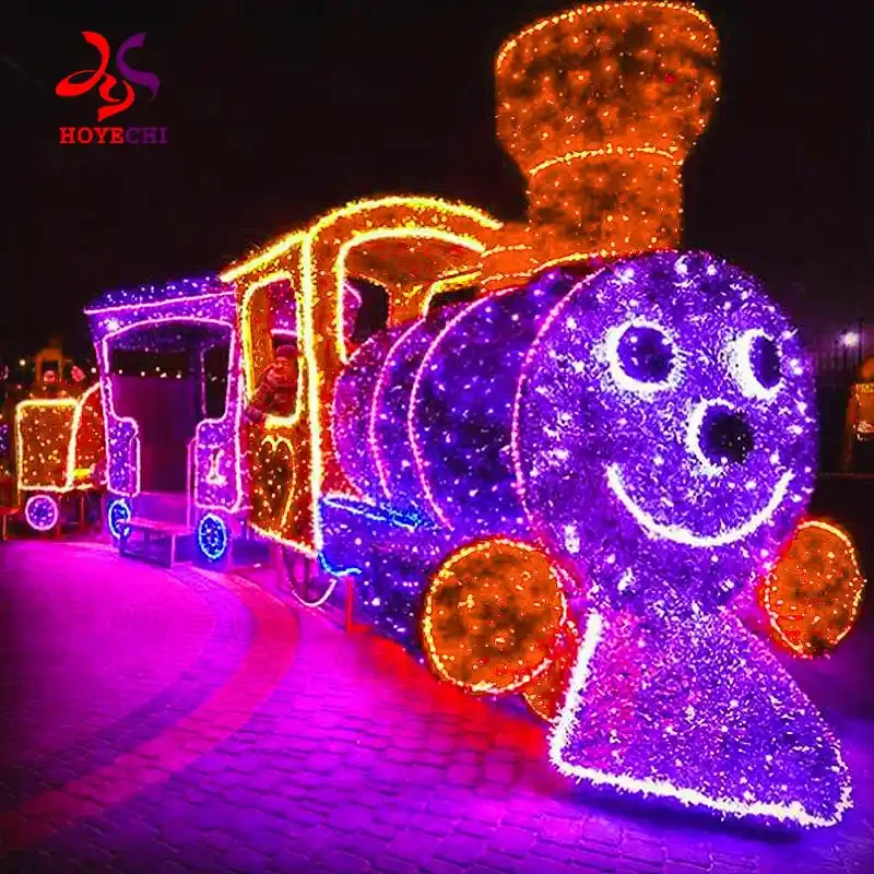Illuminated Christmas train decoration photographed at night