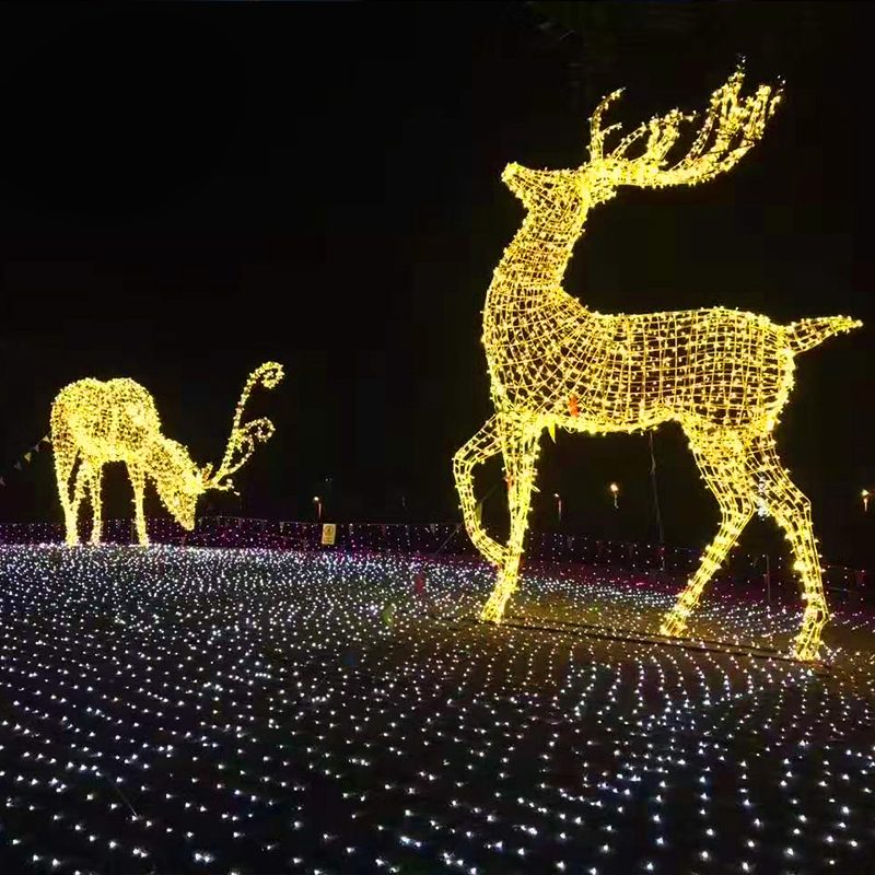 Outdoor LED Christmas reindeer light sculpture in warm white for commercial holiday display
