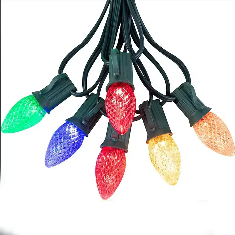 Multicolor C7 C9 LED string lights with faceted bulbs and dark green cable