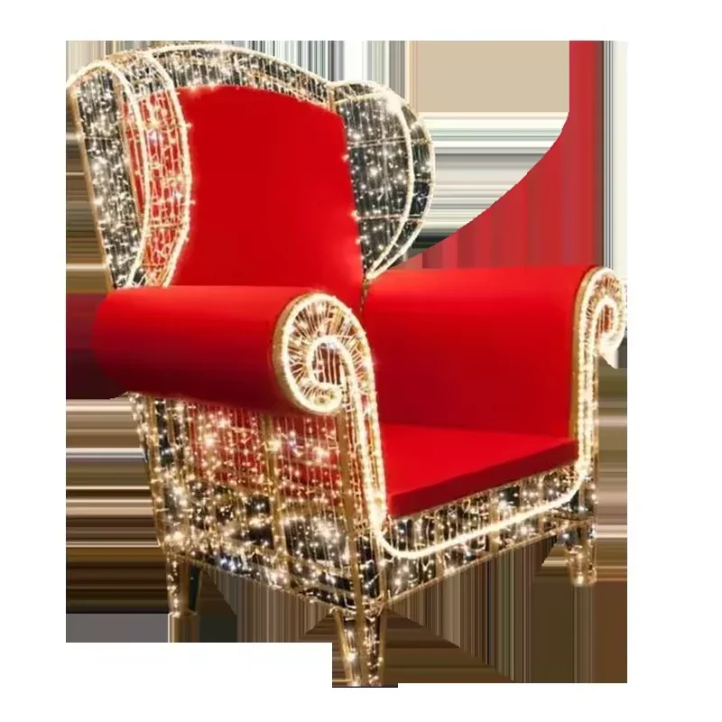 Red Santa throne chair with illuminated silver scrollwork