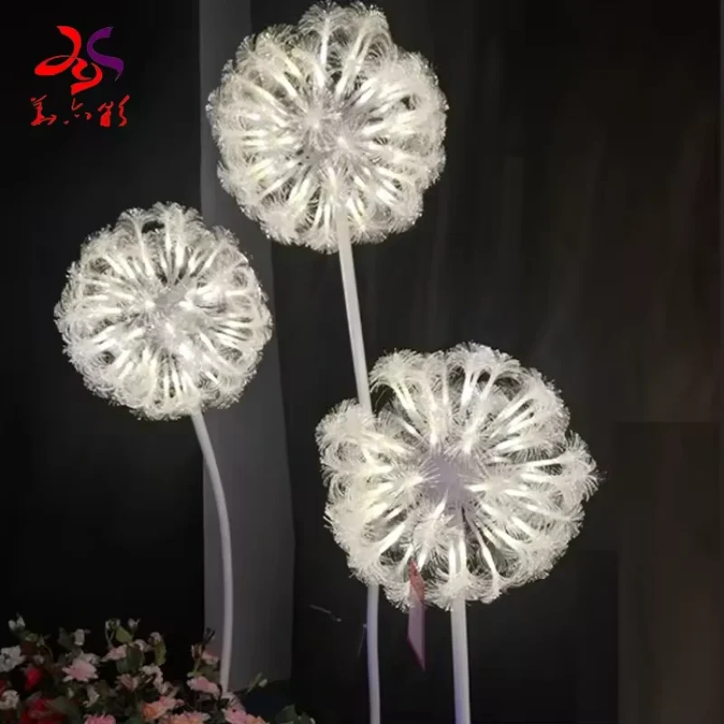 Luzes gigantes em forma de flor de dente-de-leão com LED branco, a alturas variadas