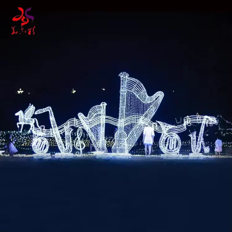 Giant LED harp and musical instrument light sculptures in an outdoor ensemble
