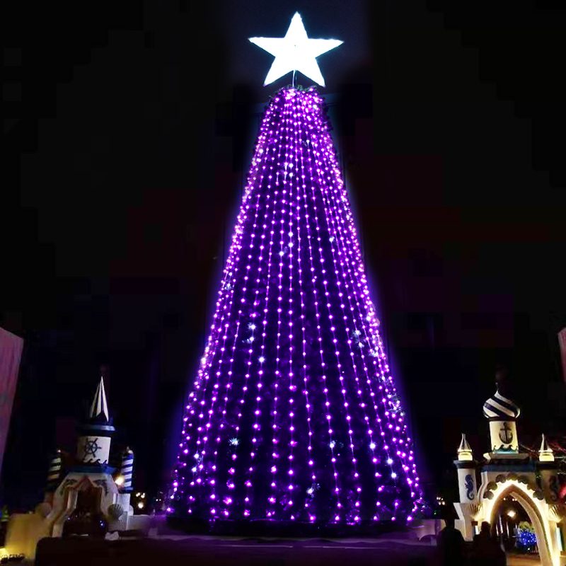 Large purple LED Christmas tree with illuminated star topper for outdoor commercial holiday display